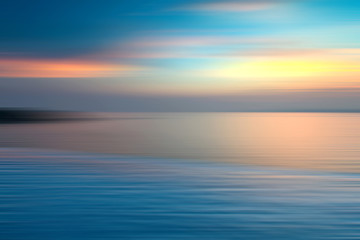 Naklejka na ściany i meble Motion blurred background of refraction in the sea