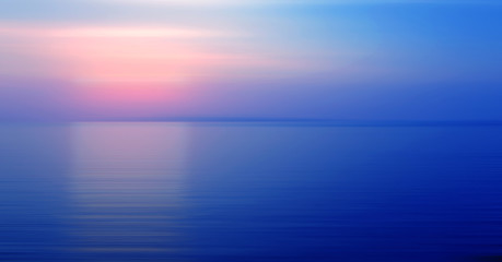 Abstract background motion blur sunset on the sea