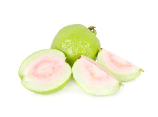 whole and half cut fresh ripe pink guava on white background