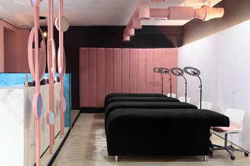 Interior of luxury stylish beauty salon.Place for eyelash extension .Pink concept design.