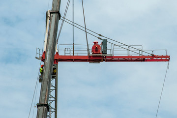 A Construction Sky Crane being removed from a new high rise multistory building site. Australia