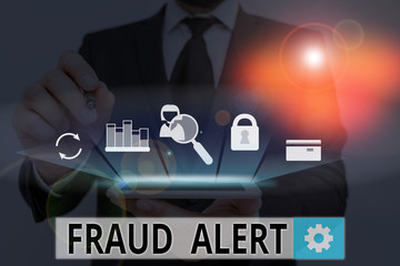 Handwriting text Fraud Alert. Conceptual photo security alert placed on credit card account for...