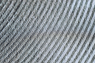 Old electric range solid metal disc heating element. Damaged and peeling. Macro