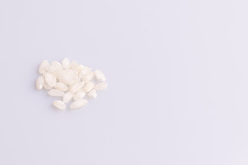 Italian Risotto rice on white background. Copy Space. Soft light. Latin term 