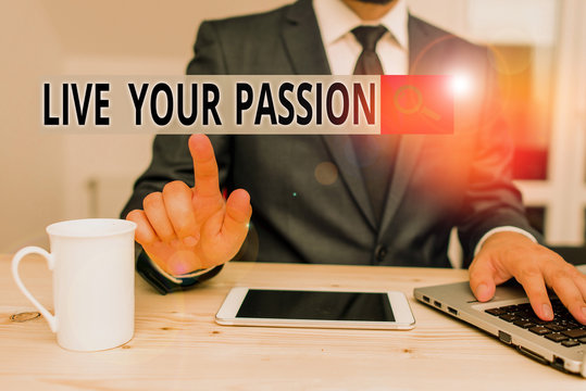 Handwriting text Live Your Passion. Conceptual photo Doing something you love that you do not consider a job Male human wear formal clothes present presentation use hi tech smartphone