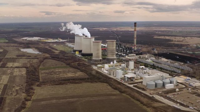 Power plant cooling towers steam drone footage