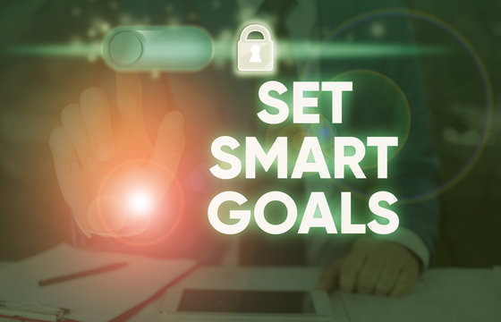 Writing note showing Set Smart Goals. Business concept for Establish achievable objectives Make good business plans