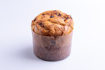 Christmas chocolate cake panettone on white background, soft light, angle view, also know as chocotone panetone, copy space