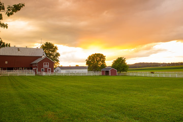 Typical Amish farm at sunset seen from Pennsylvania Dutch area - 304261719