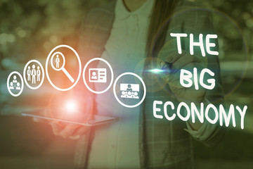 Conceptual hand writing showing The Big Economy. Concept meaning Global finances Worldwide Market...