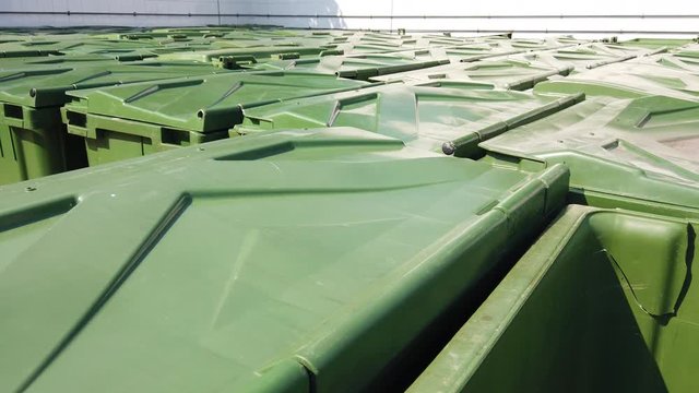 Green colour rubbish trash can