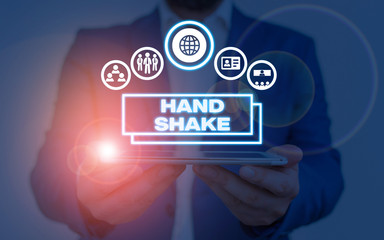 Writing note showing Hand Shake. Business concept for an act showing that you have made an agreement or greeting
