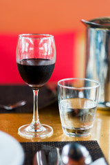glass of wine and tab water