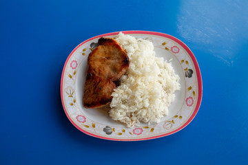 Asian kitcken, Fried Chicken with white Rice on the plate