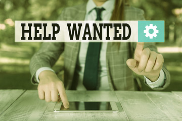 Handwriting text writing Help Wanted. Conceptual photo An ad in the paper an employer places to...