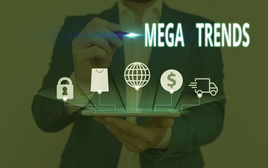 Writing note showing Mega Trends. Business concept for powerful phenomena impacting the foundations of our world