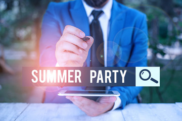 Handwriting text Summer Party. Conceptual photo social gathering held during summer season or school break Businessman pointing with pen in empty copy space