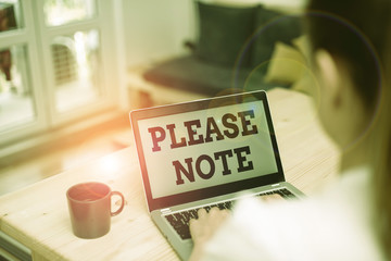 Writing note showing Please Note. Business concept for formal way to direct showing s is attention to some information woman laptop computer office supplies technological devices inside home