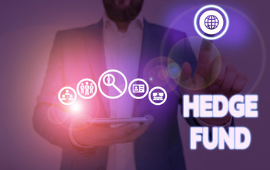 Writing note showing Hedge Fund. Business concept for basically a fancy name for an alternative investment partnership