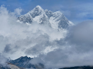 Summit of mount Everest in the clouds , Himalayas mountain range in Nepal