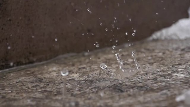 Splashes of water drops in slow motion