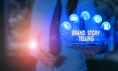 Writing note showing Brand Story Telling. Business concept for Breathing Life into a Brand an...