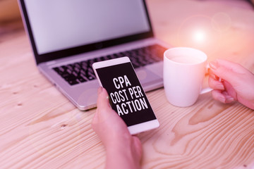 Writing note showing Cpa Cost Per Action. Business concept for Commission paid when user Clicks on...