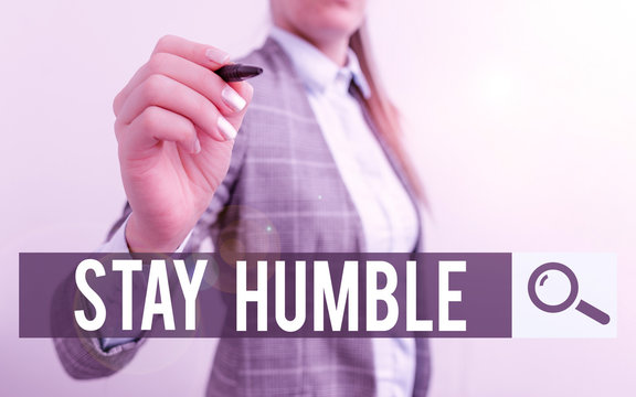 Handwriting text writing Stay Humble. Conceptual photo not proud or arrogant Modest to be humble although successful Business woman pointing in empty space with pen