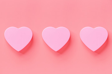 Valentine's day background with pink hearth. Flat lay, top view, mockup, template, copy space. Minimal abstract composition for 14 February celebration