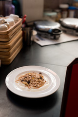 homemade muesli on white dish