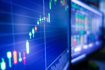 Blue stock exchange market graph on LED screen for business analysis. Finance and economic graphs.