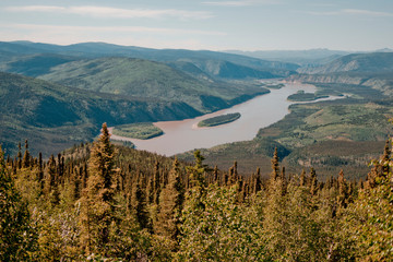 Fototapeta premium Landscape view of the Klondike River outside Dawson City, YT.