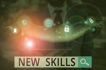 Writing note showing New Skills. Business concept for Recently Acquired Learned Abilities Knowledge Competences