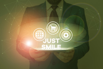 Text sign showing Just Smile. Business photo showcasing assume a facial expression indicating pleasure or amusement