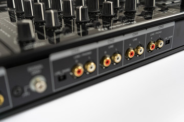 Cable to connect professional DJ midi controller to audio mixer.Concert equipment for home party.Disc jockey technology to mix digital music tracks.RCA audio cables © Gayan