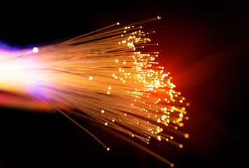 fiber optics network cable for ultra fast internet communications, thin light threads that move...