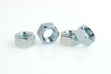 steel nuts isolated on white background