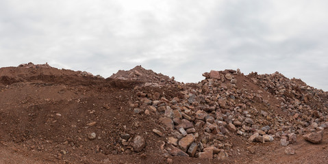 Panorama of stone mound on the construction site