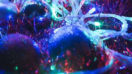 Christmas colorful New Year's Bokeh neon lights. Abstract Blurred photo background with blinking...