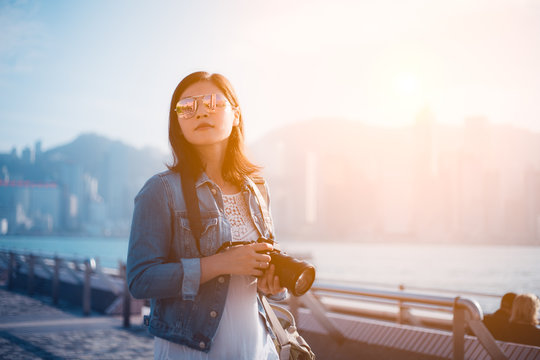 Female Photographer Taking Photo In Hong Kong 