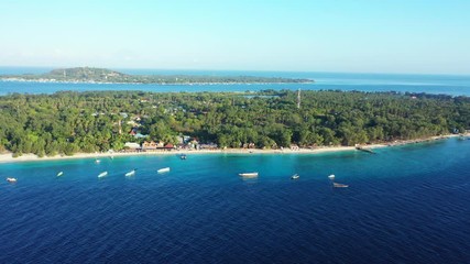 A remote island surrounded by healthy coral reefs off the coast of New Britain, Papua New Guinea.