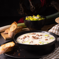 Delicious cheese and leek soup with minced meat