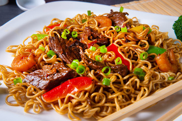 Fried Mie noodles with beef and vegetables.