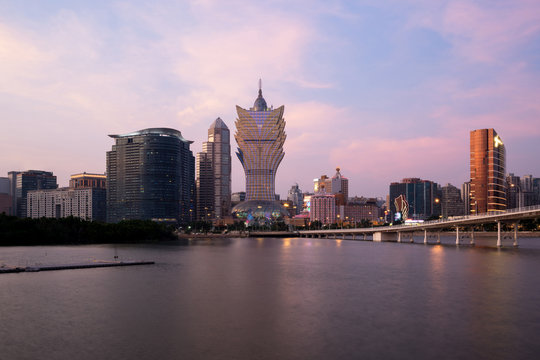 Image of Macau (Macao), China. Skyscraper hotel and casino building at downtown in Macau (Macao). Asian tourism, modern city life, or business finance and economy concept. - Powered by Adobe