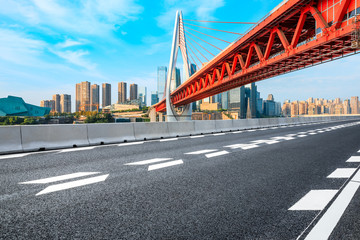 Empty asphalt road and city bridge Chongqing