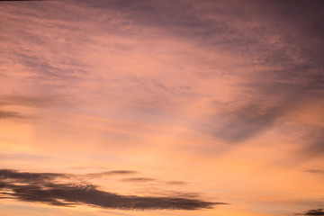 Fototapeta premium Bright orange sky and cloud and light of the sun set