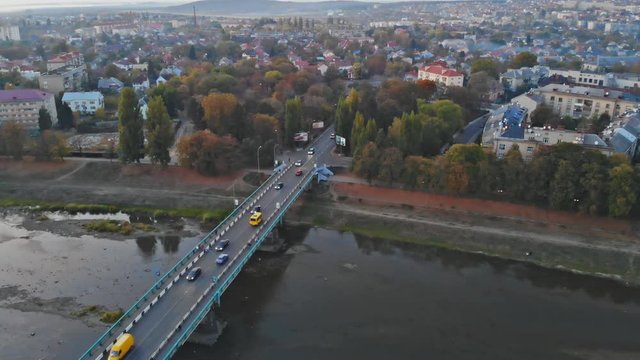 small town panoramic view from above in the autumn over the Uzh River during the sunset Uzhhorod Ukraine Europe