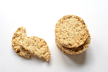 slices of wheat slimming crispy rice cakes on a white back
