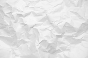 White crumpled paper texture background.