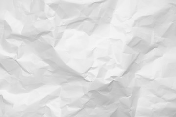 White crumpled paper texture background.